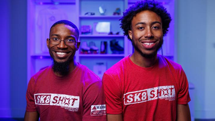 Co-Owners of Sk8 SHOT Studios smiling