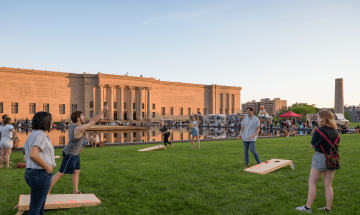 Playing bags in front of the Nelson-Atkins Museum